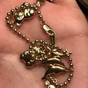 Beautiful 14k vintage solid gold charm bracelet